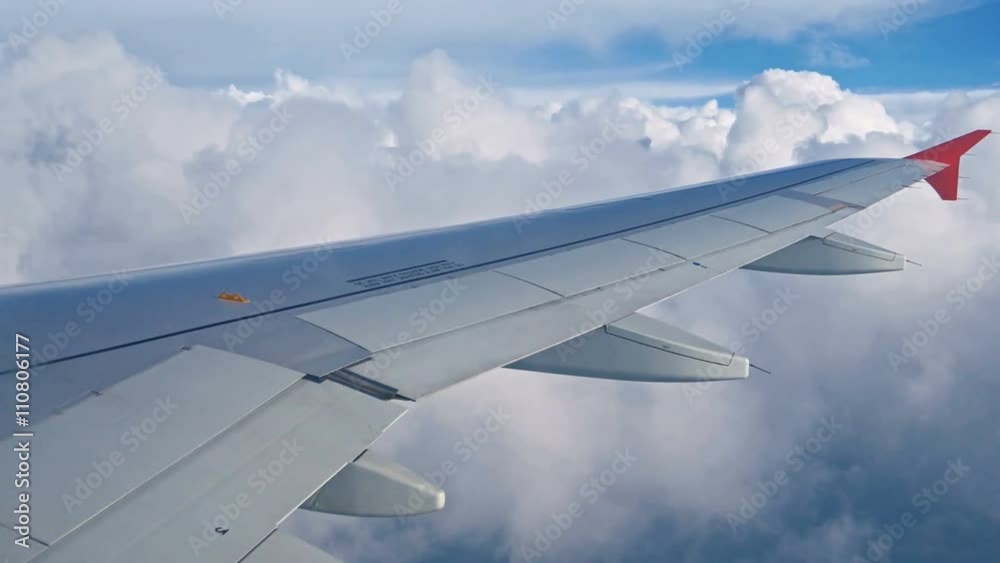 Flying Plane on a Background of Clouds. Ultra hd Flying Plane on a Background of Clouds. Ultra hd