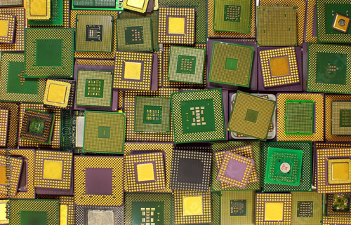 Many old CPU chips and obsolete computer processors as background photo