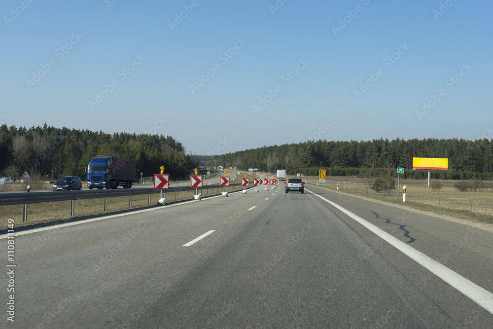 Road signs in a highway on reconstruction Road signs in a highway on reconstruction