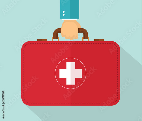 Hand holding healthcare briefcase