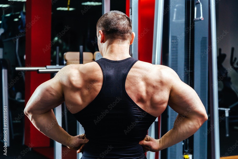 Fototapeta premium Athlete posing back