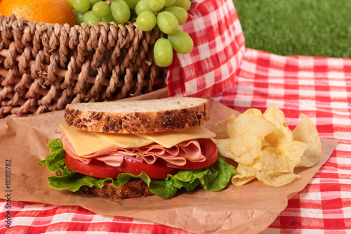 Summer picnic basket ham and cheese sandwich