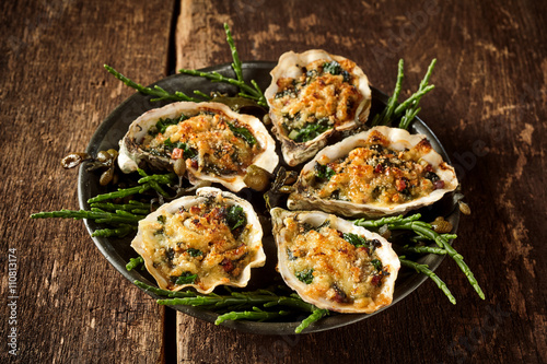 Platter of Oysters with Gratin Topping on Table