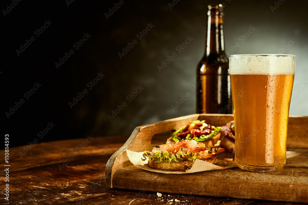 Beer and tapas on table Stock Photo Adobe Stock