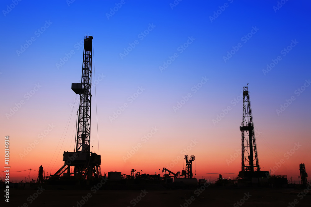 The silhouette of oilfield derrick The silhouette of oilfield derrick