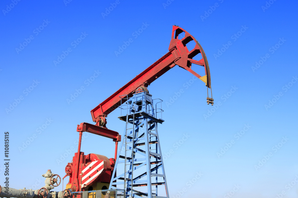 Oil field, oil pump in the work Oil field, oil pump in the work