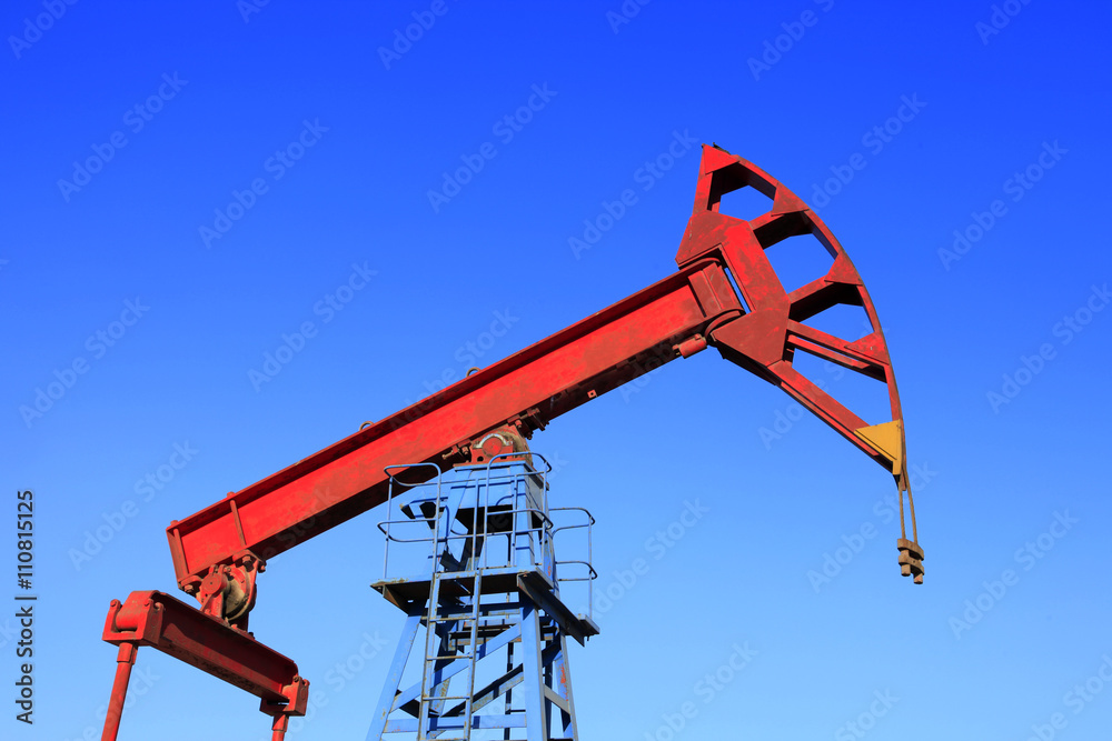Oil field, oil pump in the work Oil field, oil pump in the work