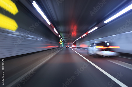 Car traffic in a tunnel , Tokyo highway