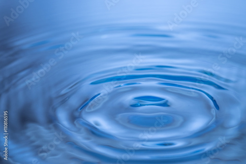 Abstract blue circle water drop ripple. Liquid texture backgroun