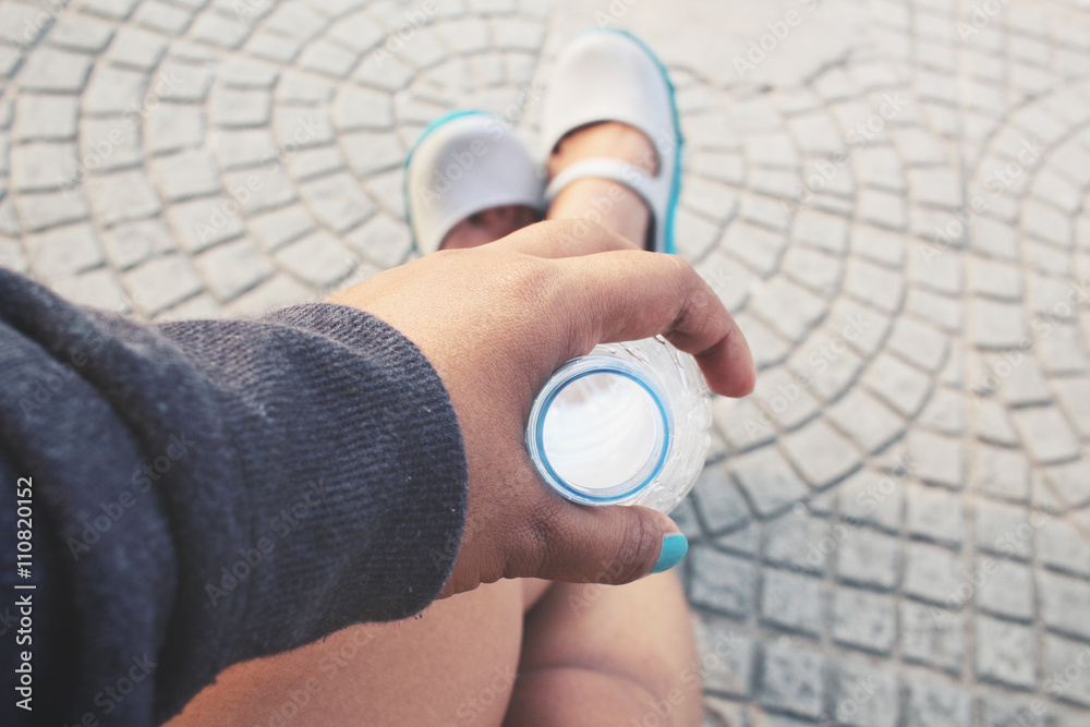 Fototapeta premium Selfie of hand with water bottle