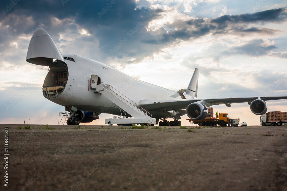 Unloading wide body cargo airplane Unloading wide body cargo airplane