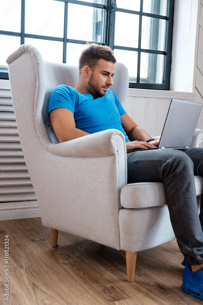 A man working with laptop. A man working with laptop.