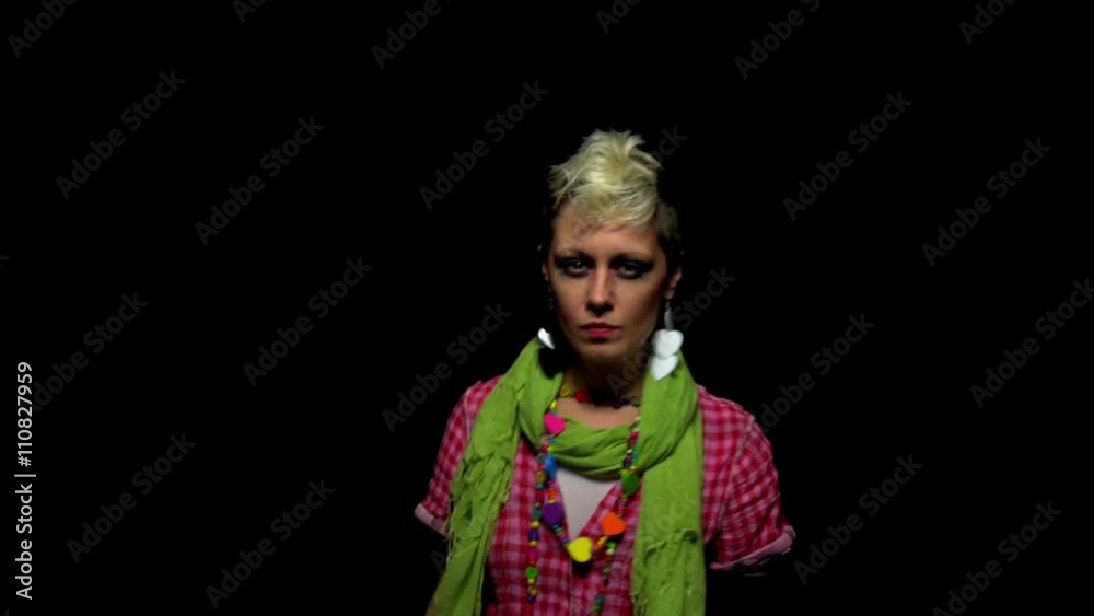 Woman with short and modern haircut dancing agressivbely
Woman with short and modern haircut dancing agressivbely