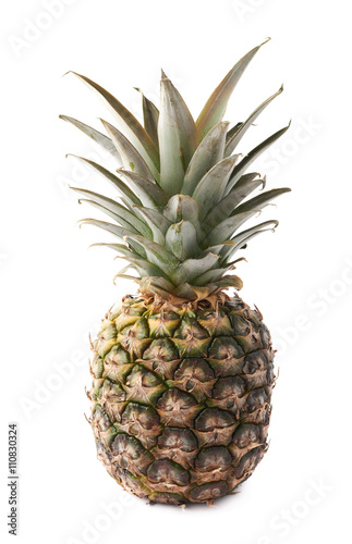Whole pineapple isolated over white background