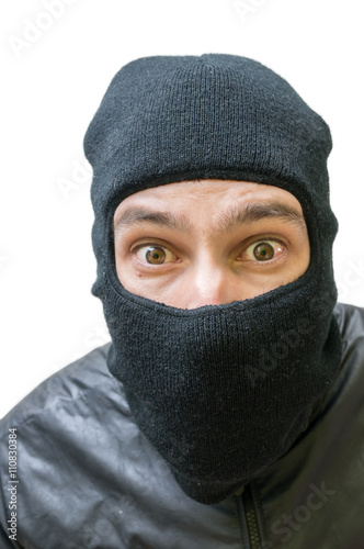 Face of burglar masked with balaclava. Isolated on white background.