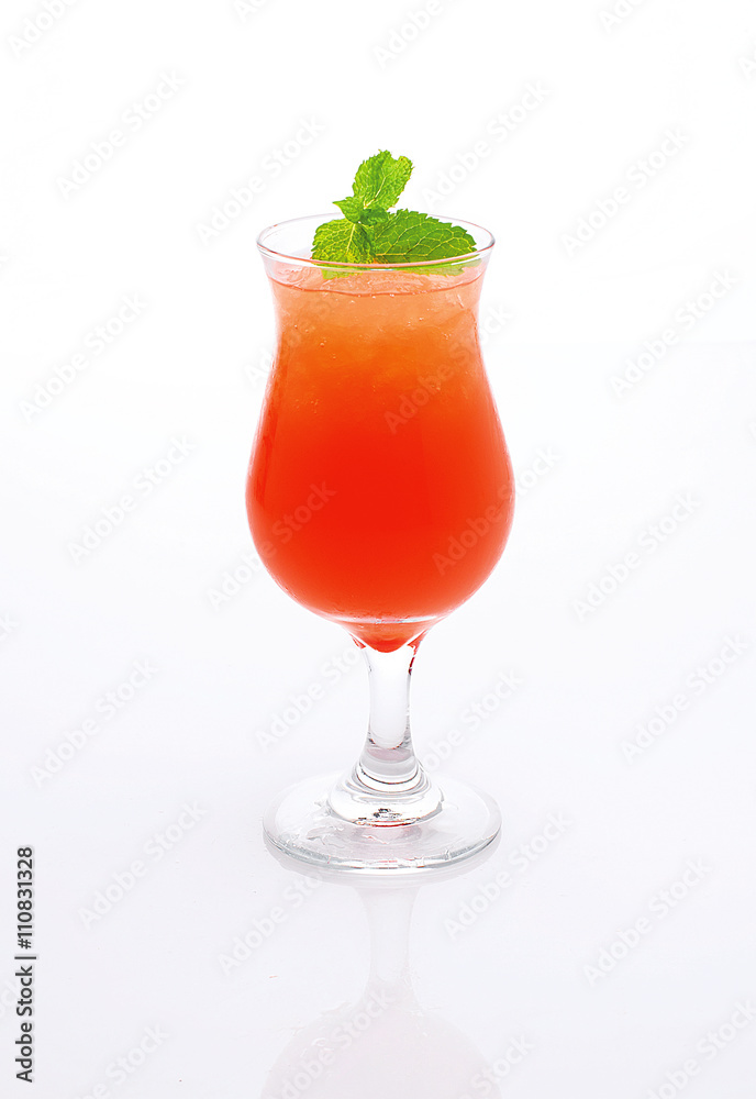 Fresh, red cocktail with ice and mint on a white background Fresh, red cocktail with ice and mint on a white background