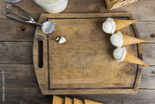 creamy vanilla ice cream in preparation with rustic background a