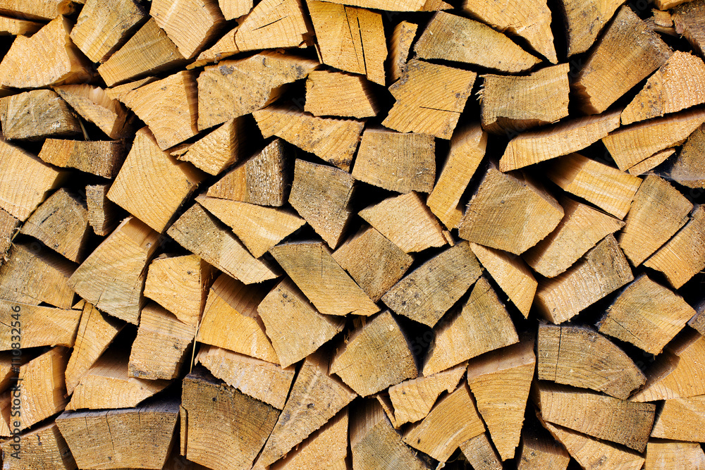 stack of firewood as a wooden background stack of firewood as a wooden background