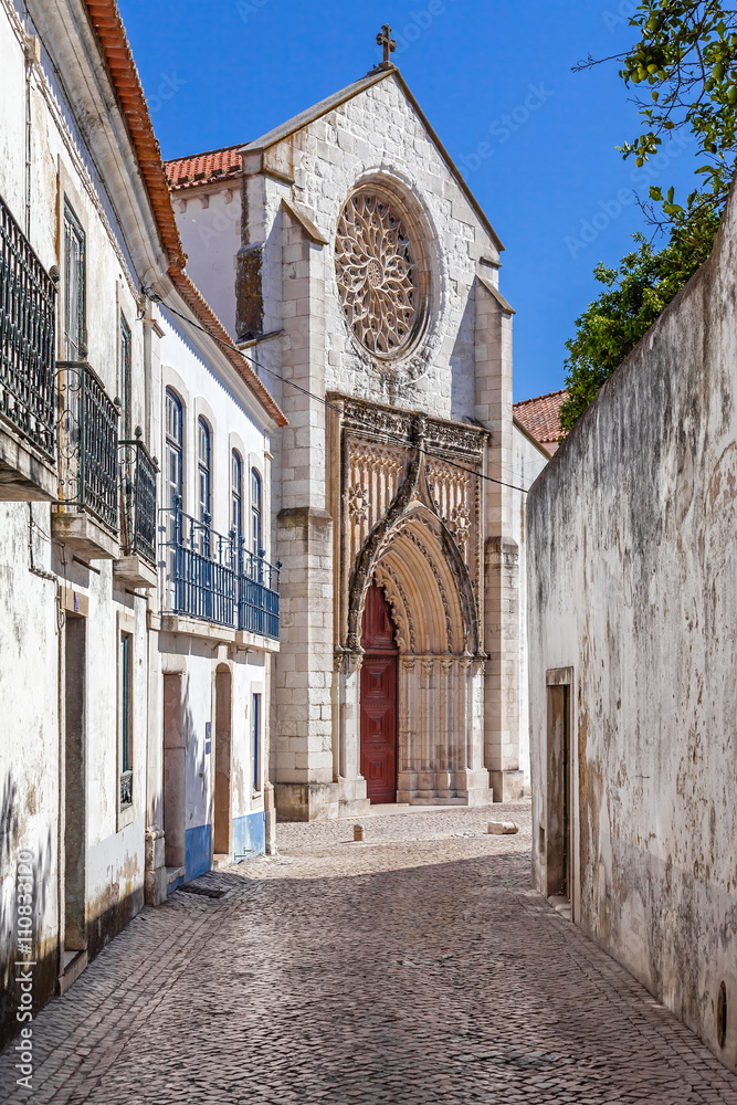 Santo Agostinho da Graca church, seen from one of the old streets of Santarem. 14th and 15th century Mendicant and Flamboyant Gothic Architecture. Santarem, Portugal.