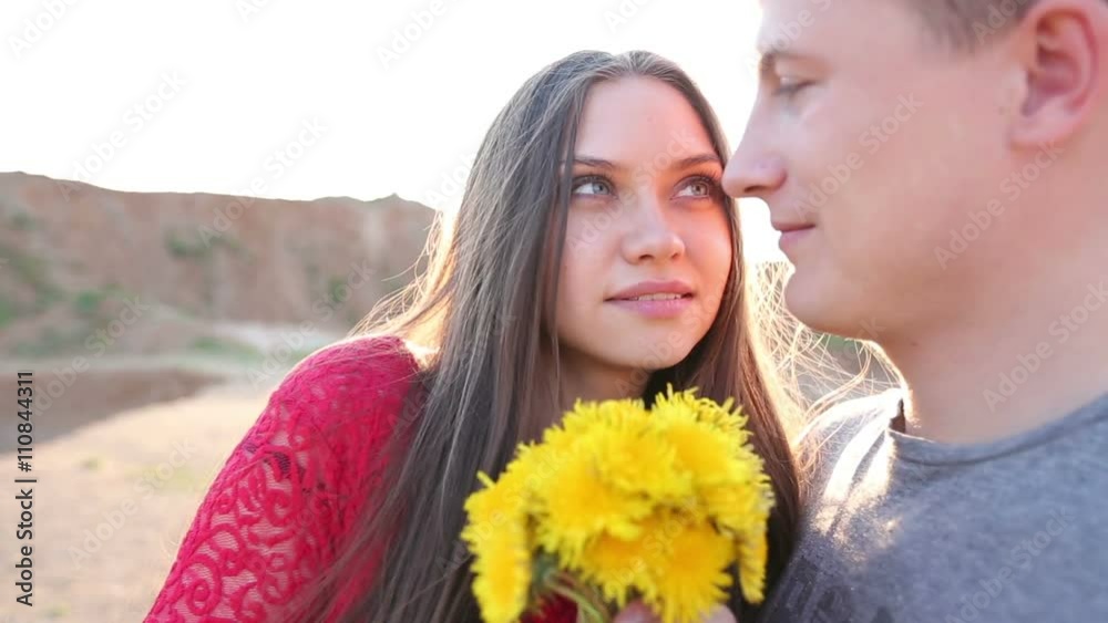 Beautiful Young Couple in Love kiss in the sun Beautiful Young Couple in Love kiss in the sun