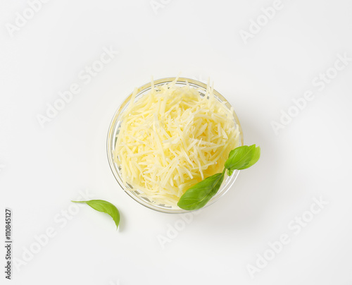 Bowl of grated cheese photo