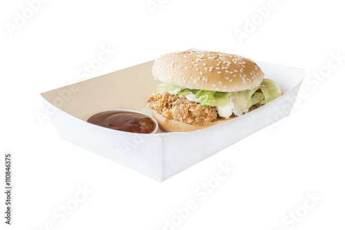 Hamburger fried chicken with ketchup on paper dish clipping path