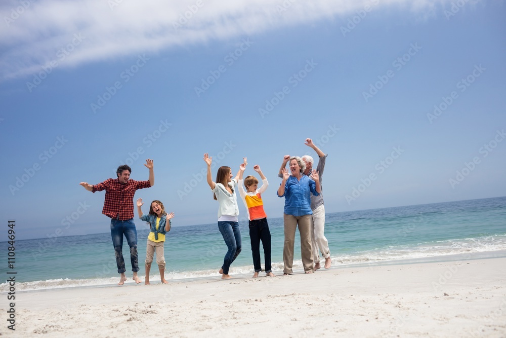 Family dancing on beach Family dancing on beach