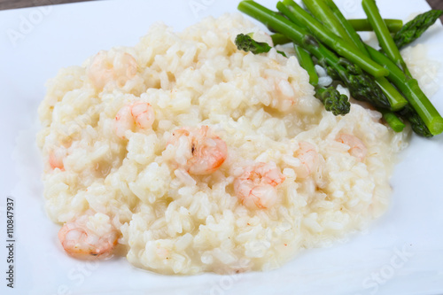 Risotto with shrimps and astaragus photo