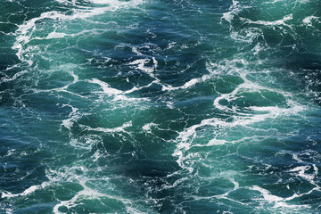 Wandcirkels Zee patronen Zeewater met schuim als achtergrond  © smuki
