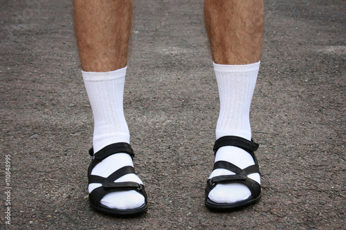 Men's feet in sandals