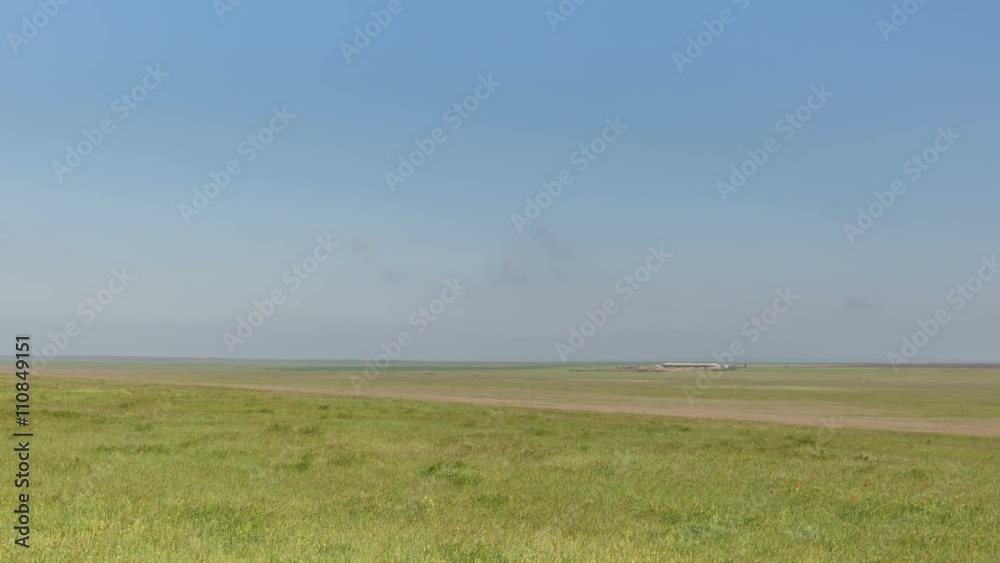 Russia, timelapse. The movement of clouds over the fields of winter wheat in early spring in the vast steppes of the Don. Russia, timelapse. The movement of clouds over the fields of winter wheat in early spring in the vast steppes of the Don.