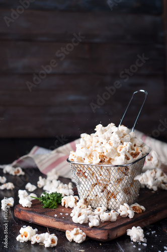 Salt popcorn in a basket