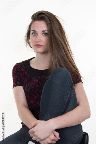 Sad young woman face close up portrait young studio