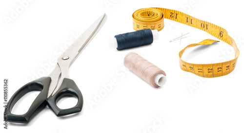 Tailors tools - scissors, thread and tape measure