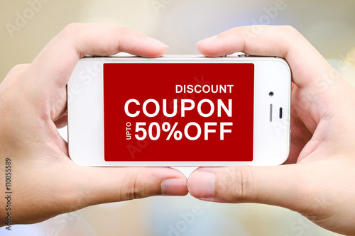 Coupon discount on smart phone screen, digital marketing