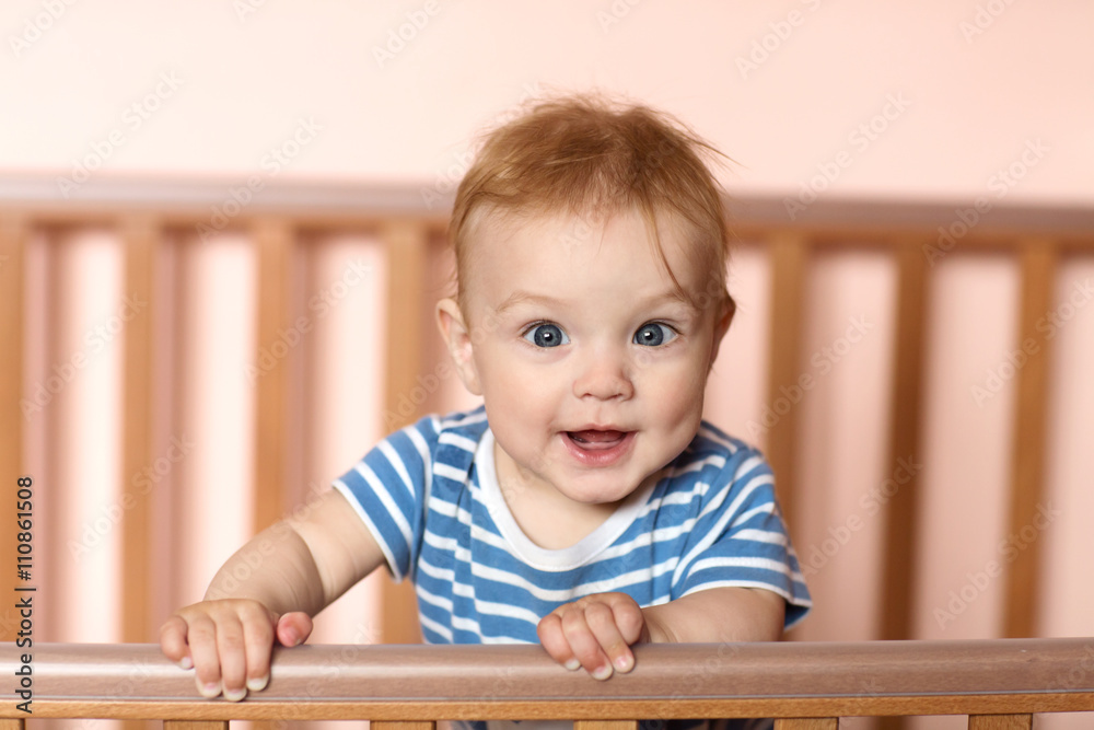 little child baby smiling standing in bed
little child baby smiling standing in bed