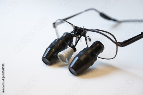 Closeup view of magnifying loupes for dentists or watchmakers photo