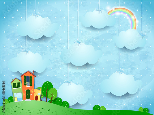Surreal landscape with hanging clouds and homes