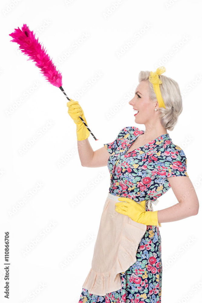 Retro housewife, with feather duster, isolated on white Retro housewife, with feather duster, isolated on white