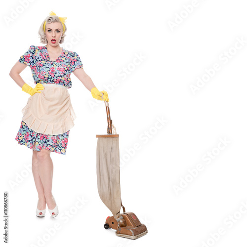 Retro housewife, with vintage vacuum cleaner, isolated on white,