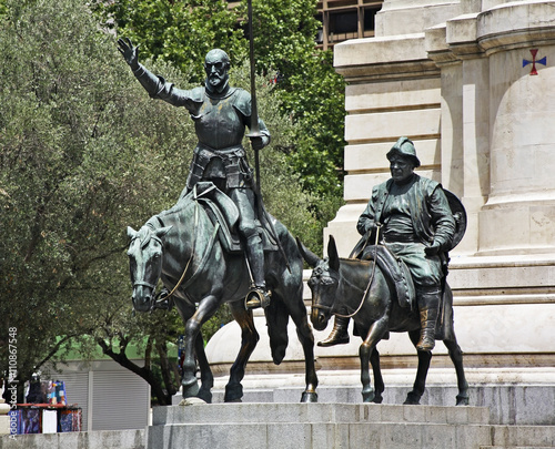 Cervantes Monument at Plaza de Espana in Madrid. Spain photo
