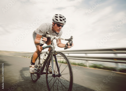 Cyclist pedaling on a racing bike outdoor