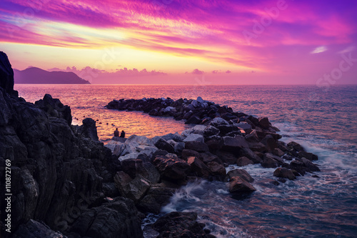 Sunset over rocky coast 