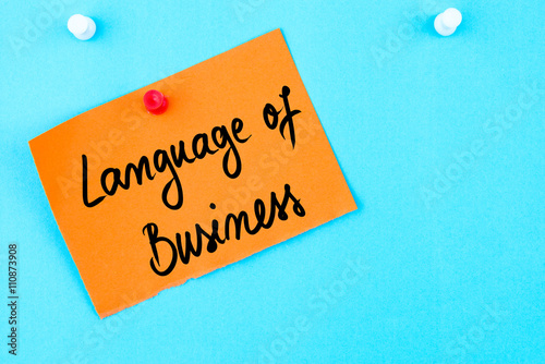 Language Of Business written on orange paper note