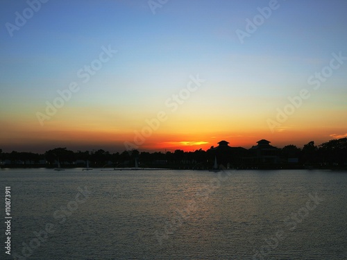 Sunset over lake © Thitinat.K