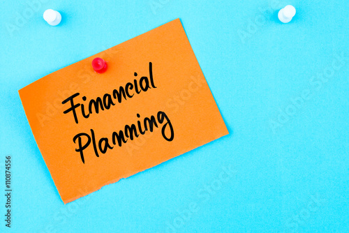 Financial Planning written on orange paper note
