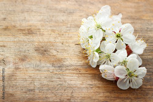 White flowers on wooden background