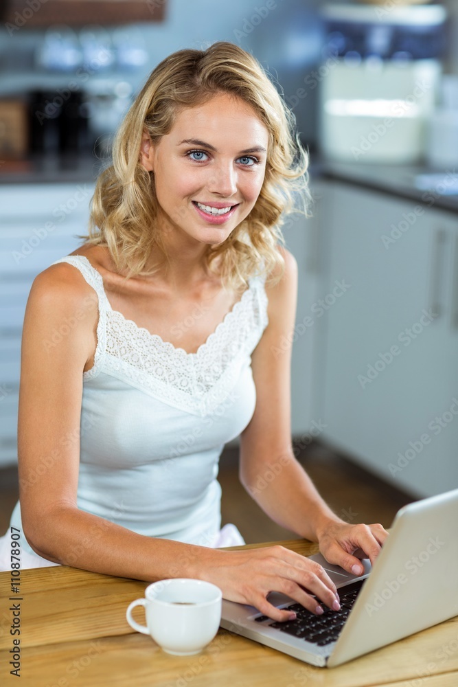 Portrait of young woman using laptop Portrait of young woman using laptop