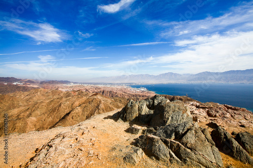 Eilat mountain range with The gulf of Aqaba in background, Israel photo