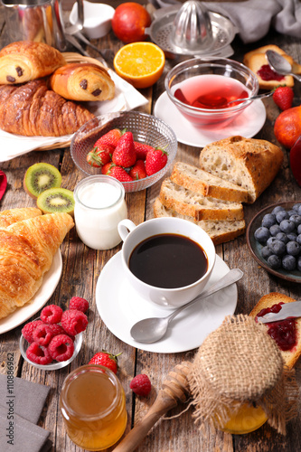 coffee cup,croissant and fruit